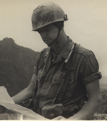 Captain John Ripley studying a map, Vietnam, 1967