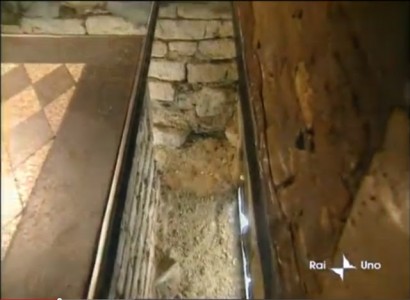 Glass on the floor for the Holy House allows pilgrims to observe the walls without foundations, still supported on the ground and partly in the air