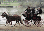 Prince Bertrand of Orleans-Braganza rides Busch family carriage pulled by Clydesdales