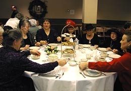 New friends and old engaged in delightful and elevated conversation.