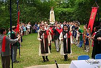 An honor guard wearing the TFP ceremonial habit escorted a pilgrim statue of Our Lady of Fatima during the final rosary procession.
