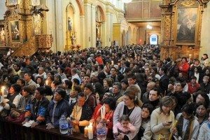 The Conceptionist Church was packed to capacity while still others waited outside to honor the Mother of God