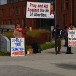 Desperate Pro-Abortion Mob Harasses TFP Volunteers at George Mason University