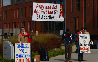 Desperate Pro-Abortion Mob Harasses TFP Volunteers at George Mason University