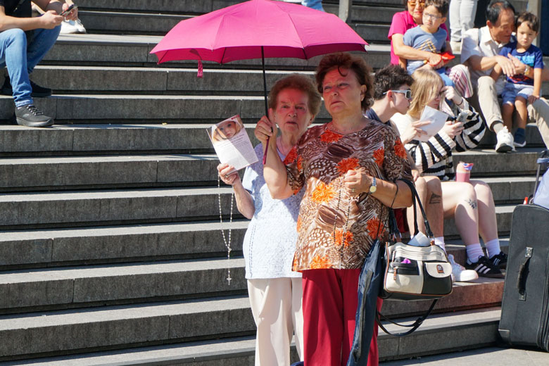 As the TFP Public Square Rosary began some ladies joined the Rosary