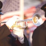 Volunteers who Honor the Legacy of Heroes with “Taps”