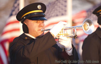 Volunteers who Honor the Legacy of Heroes with “Taps”