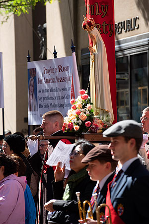 One Million Catholics Pray the Rosary in the Streets Statue of Our Lady of Fatima carried by TFP members in Ceremonial Habit during the 2019 Public Square Rosary Rally in New York City