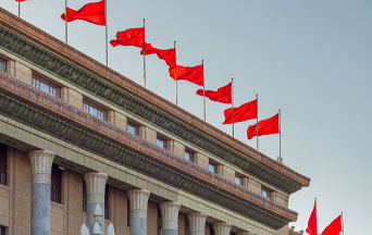 Why Does Red China Always Have a Green Light at Environmental Stop Lights?