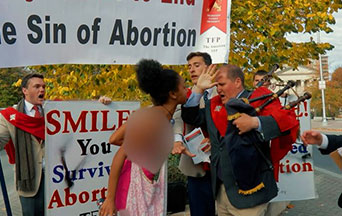 
Woman Attacks Prayerful Pro-Life Event with Black Paint